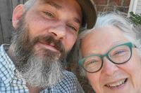 U.S. Army veteran Alexander Drueke poses for photo with his mother.