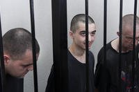 British and Moroccan prisoners behind bars in Ukraine.