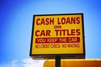 Sign advertising cash loans on car titles