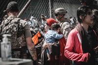 Evacuees await their departure at Hamid Karzai International Airport.