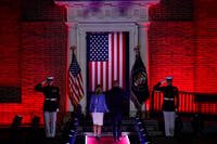 President Joe Biden salutes as he departs with first lady Jill Biden.