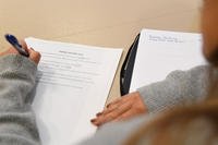 The wife of a chief master sergeant attends a resume writing class during the Keesler Job Fair inside the Bay Breeze Event Center at Keesler Air Force Base, Mississippi.