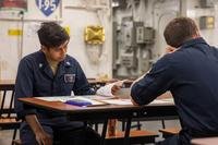 A sailor prepares to take the Navy-wide Advancement Exam.