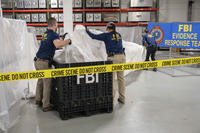 FBI special agents process material recovered from the high altitude balloon.