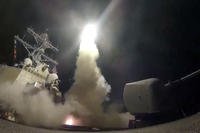 guided-missile destroyer USS Porter launches a tomahawk land attack missile in the Mediterranean Sea
