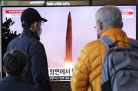 North Korea's missile launch during a news program at the Seoul Railway Station in Seoul