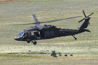 A U.S. Black Hawk helicopter takes off after deploying soldiers during the Swift Response 22 military exercise