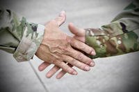 More than 100 Army Reserve soldiers from the 340th Chemical Company, 76th Operational Response Command, exited a plane and were greeted by a group of senior leaders from the 76th ORC at the airport on Fort Hood, Texas.