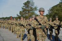 Army infantry recruits t march to the confidence course on Fort Benning.