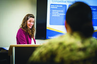 Stefanie Hurley, Fleet &amp; Family Service Center (FFSC) Rota Transition Assistance Program (TAP) manager, briefs class participants during a regularly scheduled TAP class on Naval Station Rota, Spain.