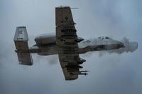 An A-10 Thunderbolt II conducts a strafing run