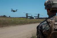U.S. Marine Corps MV-22B Ospreys land during a helicopter raid course.
