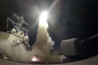 guided-missile destroyer USS Porter (DDG 78) launches a tomahawk land attack missile in the Mediterranean Sea