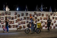 A photo memorial for the people captured by Hamas militants in Tel Aviv, Israel.