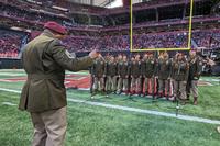 82nd Airborne Division Chorus performs &quot;God Bless America&quot; at halftime