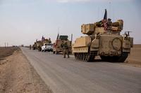 A convoy of M2A2 Bradley Fighting Vehicles in Syria