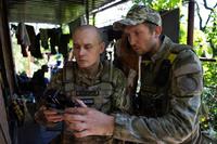 Ukrainian servicemen correcting artillery fire by drone.