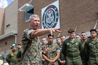 The Commandant of the Marine Corps, Gen. Eric M. Smith, speaks with Marines