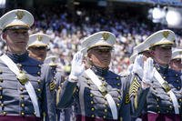 Cadets recite the oath of office during the graduation ceremony of the U.S. Military Academy Class of 2023 at Michie Stadium in West Point, N.Y.
