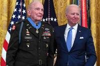 President Joe Biden presents the Medal of Honor to former U.S. Army Col. Ralph Puckett Jr. during a ceremony at the White House in Washington, D.C.