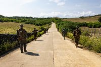 U.S. Marines with 3rd Littoral Combat Team, 3rd Marine Littoral Regiment, 3rd Marine Division, and Philippine Marines with Marine Battalion Landing Team 10 conduct a civil reconnaissance patrol during the maritime key terrain security operations event of Exercise Balikatan 24 at Itbayat, Philippines, May 6, 2024. (Cpl. Malia Sparks/U.S. Marine Corps photo)
