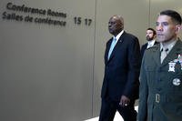 United States Secretary of Defense Lloyd Austin, left, arrives for a bilateral meeting
