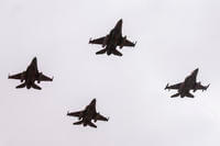 F-16 fighter jets perform a maneuver in Morocco.