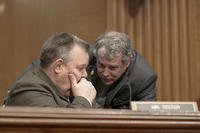 Sen. Sherrod Brown, D-Ohio, right, and Sen. Jon Tester, D-Mont., are seen during a Senate Banking, Housing and Urban Affairs Committee hearing to examine the Financial Stability Oversight Council Annual Report to Congress, Thursday, Feb. 8, 2024, on Capitol Hill, in Washington.