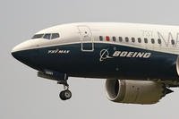 A Boeing 737 Max jet, piloted by Federal Aviation Administration (FAA) chief Steve Dickson, prepares to land
