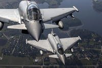Italian Air Force Eurofighter Typhoon military fighter jets participate in NATO's Baltic Air Policing Mission