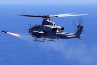 U.S. Marine Corps AH-1Z fires an AGM-179 joint air-to-ground munition