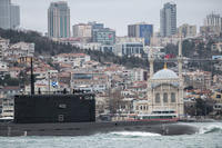 Russian sailors stand on the bridge of the Russian Navy’s Kilo-class submarine Rostov-na-Donu B-237