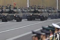 The Japan Ground Self-Defense Force tanks parade in Japan.