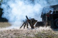 U.S. Army soldiers fire mortar rounds