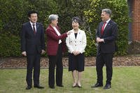 Japanese Defense Minister Minoru Kihara, left, Australian Foreign Minister Penny Wong, second left