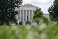 U.S Supreme Court is viewed from the lawn of the U.S. Capitol