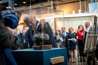 Retired Vietnam POW Cmdr. Everett Alvarez Jr. looks at a bust of himself