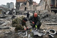 Fragments of a rocket at the site of a missile attack in Kyiv