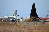 Recovery teams work at the scene where a Jeju Air Boeing 737-800 series aircraft crashed and burst into flames