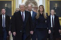 President-elect Donald Trump walks with Melania Trump at the Capitol