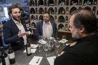 Winery owners meet inside a store in Virginia.