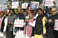 India's opposition lawmakers protest outside the Parliament in New Delhi