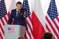 U.S. Defense Secretary Pete Hegseth during a press conference at the Polish Ministry of Defense headquarters in Warsaw