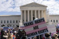 Transgenders rights supporters rally outside of the Supreme Court