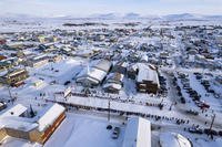 ome, Alaska, awaits the first Iditarod Trail Sled Dog Race musher