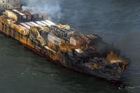 Smoke billows from the MV Solong cargo ship in the North Sea, off the Yorkshire coast