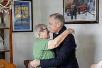 Canada Prime Minister Mark Carney gets a hug from Beulah Cooper