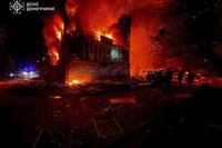Firefighters put out a fire following a Russian rocket attack in Dobropillya, Ukraine.