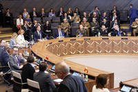 European Union foreign policy chief Kaja Kallas, third left, attends a meeting