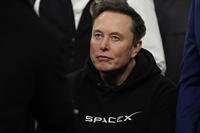 Elon Musk attends the finals for the NCAA wrestling championship